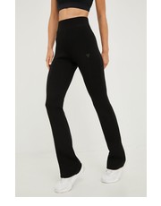 Spodnie spodnie dresowe damskie kolor czarny gładkie - Answear.com Guess