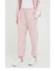 Spodnie spodnie treningowe damskie kolor różowy gładkie - Answear.com Under Armour