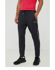 Spodnie męskie spodnie dresowe  ATHLEISURE męskie kolor granatowy z nadrukiem - Answear.com Boss