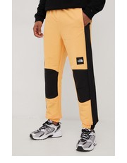 Spodnie męskie spodnie dresowe Black Box męskie kolor pomarańczowy wzorzyste - Answear.com The North Face