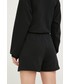 Spodnie New Balance szorty damskie kolor czarny z nadrukiem high waist