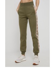 Spodnie spodnie damskie kolor zielony z aplikacją - Answear.com Guess