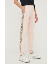 Spodnie spodnie dresowe damskie kolor różowy z nadrukiem - Answear.com Guess