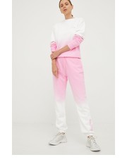 Spodnie spodnie dresowe bawełniane damskie kolor różowy z nadrukiem - Answear.com Guess