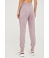 Spodnie Guess spodnie dresowe damskie kolor fioletowy z aplikacją