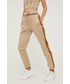 Spodnie Guess spodnie dresowe damskie kolor beżowy wzorzyste