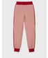 Spodnie Guess spodnie dziecięce kolor czerwony wzorzyste
