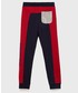 Spodnie Guess spodnie dresowe dziecięce kolor granatowy z aplikacją