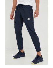Spodnie męskie spodnie dresowe męskie kolor granatowy gładkie - Answear.com Adidas
