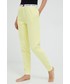 Spodnie Tommy Hilfiger spodnie dresowe damskie kolor żółty gładkie