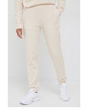 Spodnie spodnie dresowe damskie kolor beżowy gładkie - Answear.com Calvin Klein 