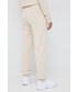 Spodnie Calvin Klein  spodnie dresowe damskie kolor beżowy gładkie