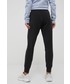 Spodnie 4F spodnie dresowe damskie kolor czarny gładkie