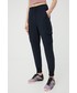 Spodnie 4F spodnie damskie kolor granatowy joggery high waist