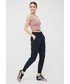Spodnie 4F spodnie damskie kolor granatowy joggery high waist