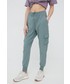 Spodnie 4F spodnie damskie kolor zielony joggery high waist