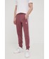 Spodnie męskie Adidas Originals adidas Originals spodnie dresowe męskie kolor różowy z aplikacją