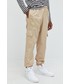 Spodnie męskie Adidas Originals adidas Originals spodnie dresowe męskie kolor beżowy z nadrukiem