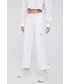 Spodnie Adidas By Stella Mccartney adidas by Stella McCartney spodnie dresowe HD0692 damskie kolor biały gładkie