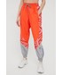 Spodnie Adidas By Stella Mccartney adidas by Stella McCartney spodnie dresowe HD9141 damskie kolor pomarańczowy wzorzyste