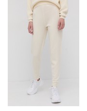 Spodnie Spodnie kaszmirowe damskie kolor kremowy - Answear.com Marciano Guess