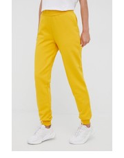 Spodnie spodnie dresowe bawełniane damskie kolor żółty gładkie - Answear.com Jack Wolfskin