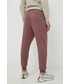 Spodnie Puma spodnie damskie kolor fioletowy gładkie