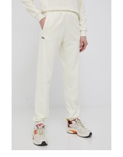 Spodnie spodnie damskie kolor beżowy z nadrukiem - Answear.com Fila