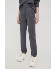 Spodnie spodnie dresowe damskie kolor szary gładkie - Answear.com Fila