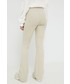 Spodnie Tommy Jeans spodnie damskie kolor beżowy dzwony high waist