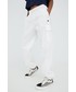 Spodnie Champion spodnie bawełniane 115340 damskie kolor biały gładkie