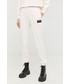 Spodnie Armani Exchange spodnie dresowe bawełniane damskie kolor beżowy gładkie