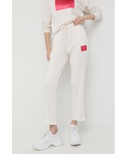 Spodnie spodnie dresowe damskie kolor beżowy z aplikacją - Answear.com Armani Exchange