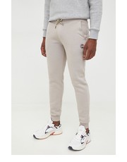 Spodnie męskie spodnie dresowe męskie kolor beżowy z aplikacją - Answear.com Colmar