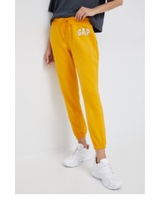 Spodnie spodnie dresowe damskie kolor żółty z aplikacją - Answear.com Gap