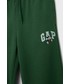 Spodnie Gap Spodnie dziecięce kolor zielony z nadrukiem
