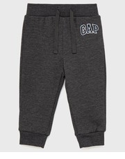 Spodnie spodnie dresowe dziecięce kolor szary gładkie - Answear.com Gap