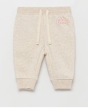 Spodnie spodnie dziecięce kolor beżowy z aplikacją - Answear.com Gap