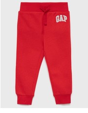 Spodnie spodnie dresowe dziecięce kolor czerwony gładkie - Answear.com Gap