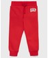 Spodnie Gap spodnie dresowe dziecięce kolor czerwony gładkie