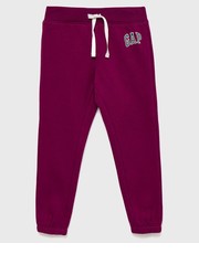 Spodnie spodnie dresowe dziecięce kolor fioletowy z nadrukiem - Answear.com Gap