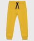 Spodnie United Colors Of Benetton United Colors of Benetton spodnie bawełniane dziecięce kolor żółty z nadrukiem