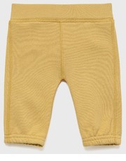 Spodnie United Colors of Benetton spodnie dresowe bawełniane dziecięce kolor żółty z aplikacją - Answear.com United Colors Of Benetton