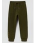 Spodnie Ovs spodnie dziecięce kolor zielony gładkie