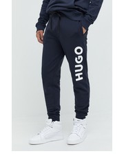 Spodnie męskie spodnie dresowe bawełniane męskie kolor granatowy z nadrukiem - Answear.com Hugo