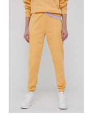 Spodnie spodnie damskie kolor pomarańczowy gładkie - Answear.com Karl Kani