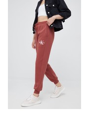 Spodnie spodnie dresowe damskie kolor czerwony gładkie - Answear.com Calvin Klein Jeans