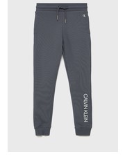 Spodnie Spodnie bawełniane dziecięce kolor szary z nadrukiem - Answear.com Calvin Klein Jeans