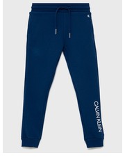 Spodnie Spodnie bawełniane dziecięce kolor granatowy z nadrukiem - Answear.com Calvin Klein Jeans