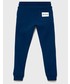 Spodnie Calvin Klein Jeans Spodnie bawełniane dziecięce kolor granatowy z nadrukiem